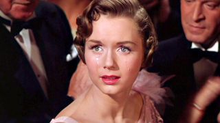 135. Поющие под дождем (1952)