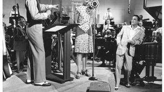 145. Поющие под дождем (1952)