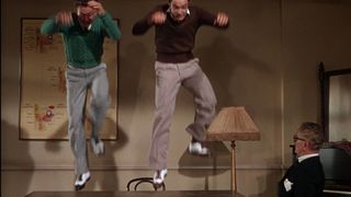 52. Поющие под дождем (1952)